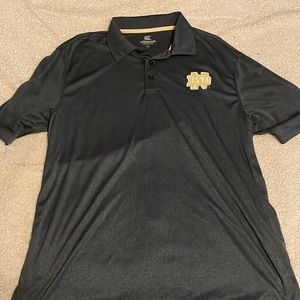 Notre Dame polo in a gray blue color with gold logo